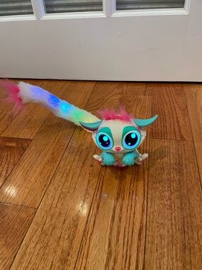 Lil Gleemerz by Mattel Interactive Light-Up Plush Toy with Rainbow Tail